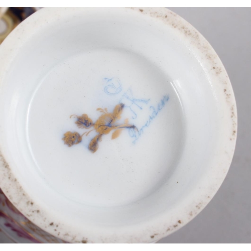 45 - An 18th century English porcelain tea bowl, decorated insects and flowers, a Ridgeway jug with flora... 