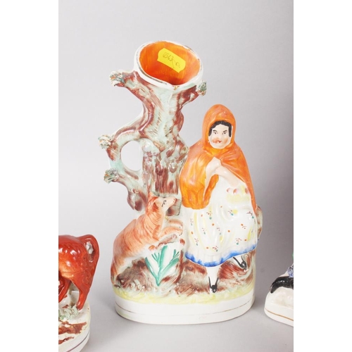 54 - Eight Staffordshire figure spill vases, including Little Red Riding Hood, 10