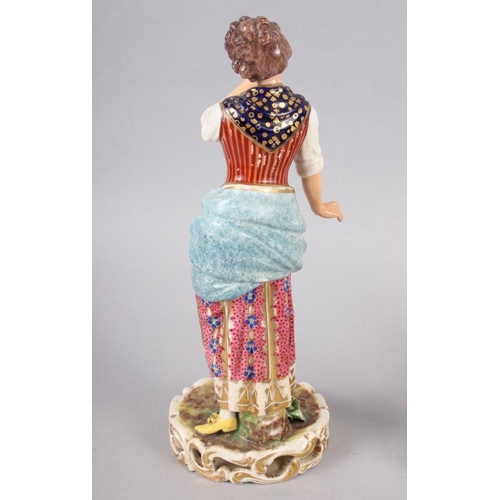 58 - A Derby figure of a woman, 10