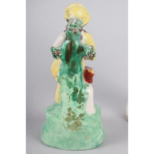 58 - A Derby figure of a woman, 10