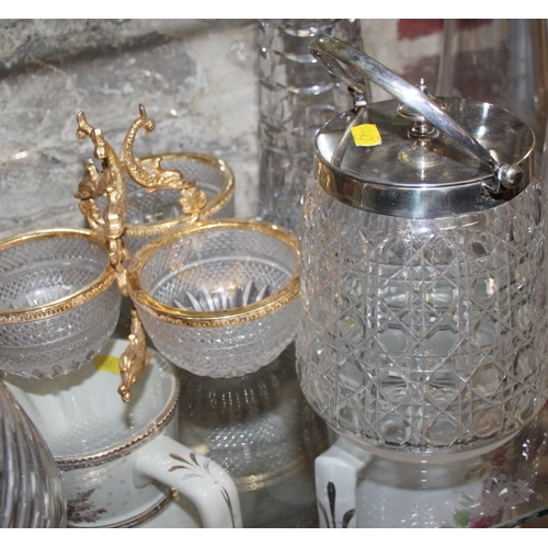 89 - Three claret jugs, two biscuit barrels and three gilt metal mounted preserve bowls