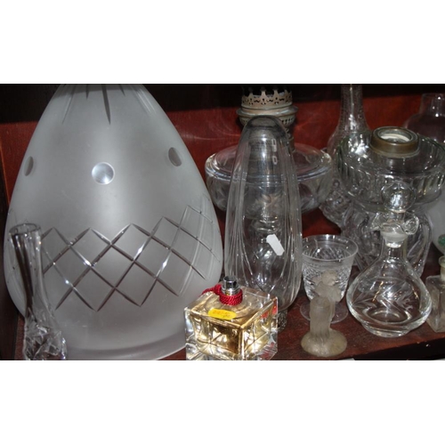 90 - A quantity of glass light fittings and shades, scent bottles and other glassware