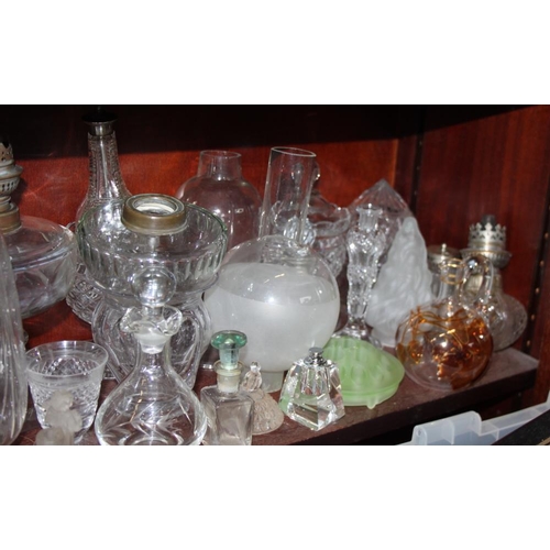 90 - A quantity of glass light fittings and shades, scent bottles and other glassware