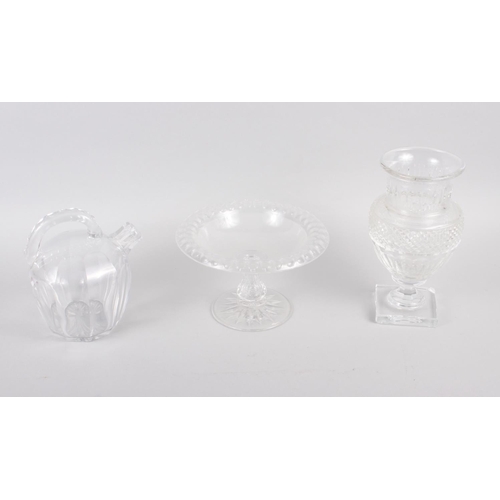 93 - A Baccarat cut glass vase, on square base, 9