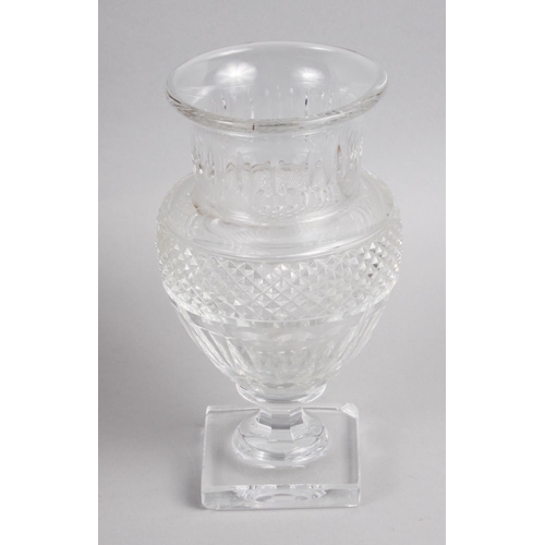 93 - A Baccarat cut glass vase, on square base, 9