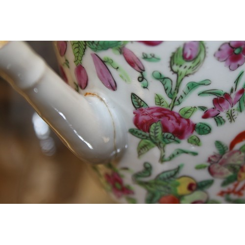 101 - A famille rose teapot, decorated figures, flowers and birds with matched lid, 7