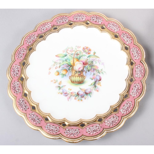 9 - Six 19th century bone china plates, decorated with baskets of flowers and fruit with pink and gilt b... 