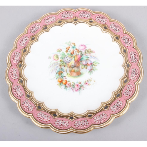 9 - Six 19th century bone china plates, decorated with baskets of flowers and fruit with pink and gilt b... 