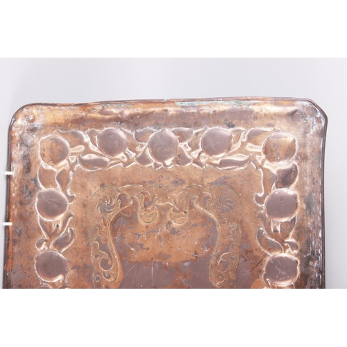 109 - A Newlyn copper tray with embossed decoration, 23