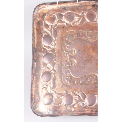 109 - A Newlyn copper tray with embossed decoration, 23