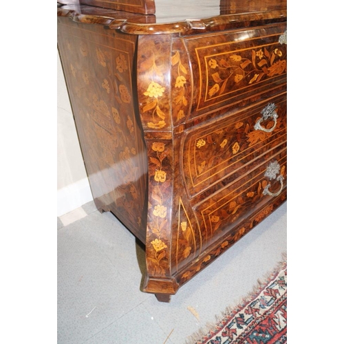 302 - An 18th century Dutch walnut and marquetry bombe commode with open shelves over three drawers and la... 