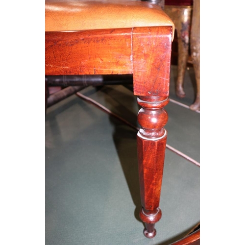 309 - A set of six early 19th century mahogany standard dining chairs with bar backs and leather drop-in s... 