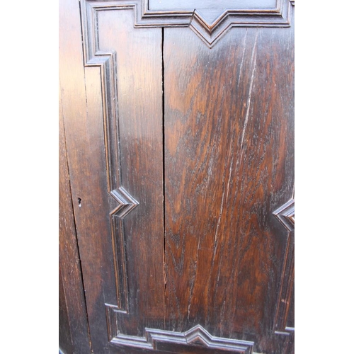 313 - A 19th century oak corner cupboard enclosed panel door, on stand with turned and stretchered support... 