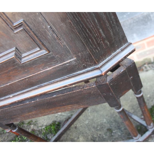 313 - A 19th century oak corner cupboard enclosed panel door, on stand with turned and stretchered support... 