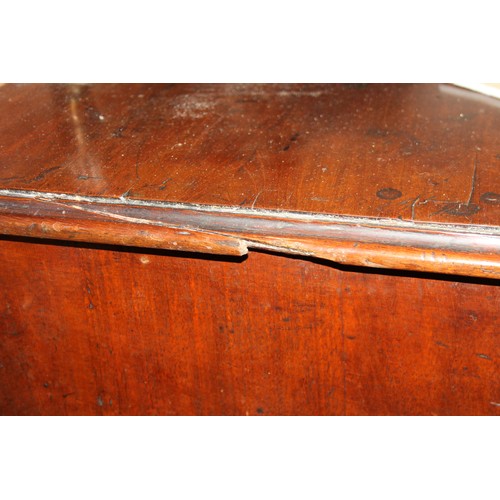 324 - A Georgian mahogany chest of two short and three long graduated drawers with pierced brass escutcheo... 