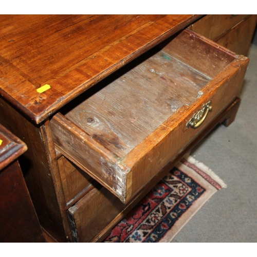 326 - An 18th century walnut and banded chest of two short and two long drawers with brass handles and pie... 