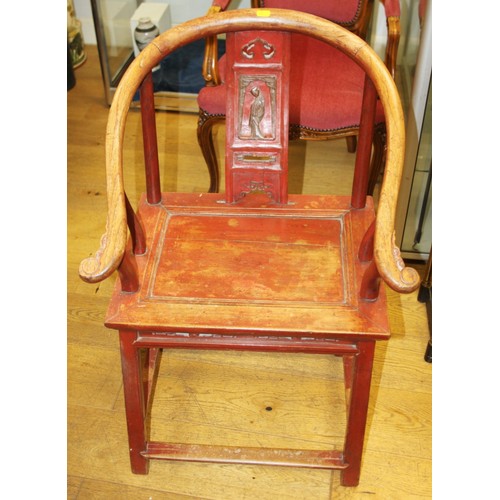 367 - A Chinese carved hardwood and red lacquered open armchair, on square stretchered supports
COLLECT