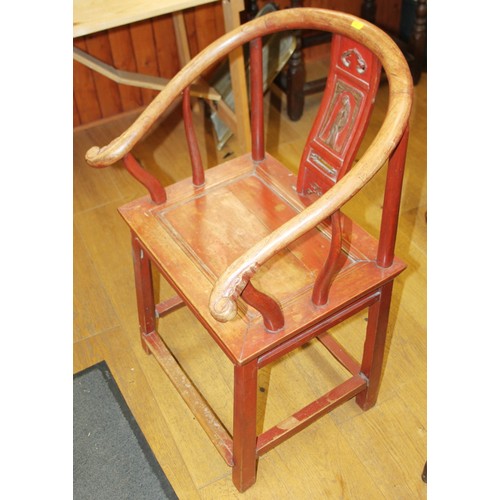 367 - A Chinese carved hardwood and red lacquered open armchair, on square stretchered supports
COLLECT