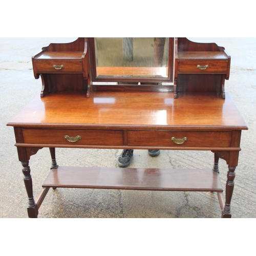 390 - An early 20th century mahogany dressing table, fitted two jewel drawers and mirror, over two further... 