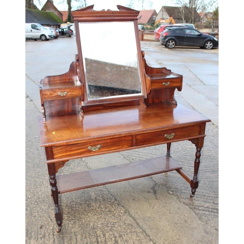 390 - An early 20th century mahogany dressing table, fitted two jewel drawers and mirror, over two further... 