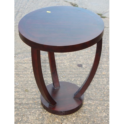 391 - An Art Deco design hardwood two-tier occasional table, 26