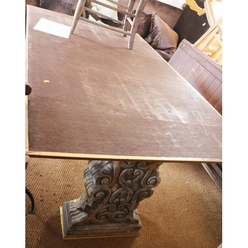 405 - A green marble top dining table, on faux carved stone supports, top 68