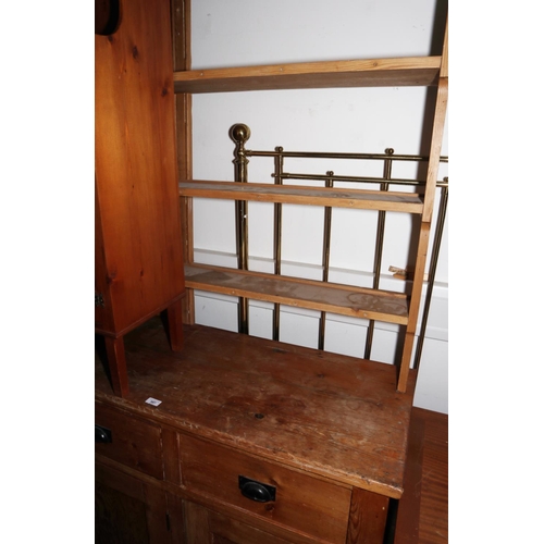 416 - A waxed pine dresser with open shelves over three drawers and three cupboards, on block base, 62