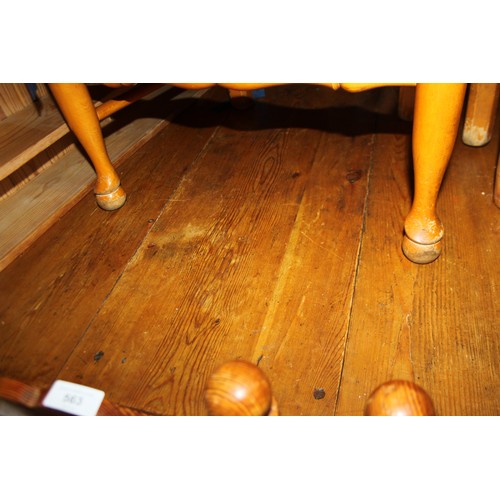 420 - A waxed pine kitchen table, on square taper supports, 71