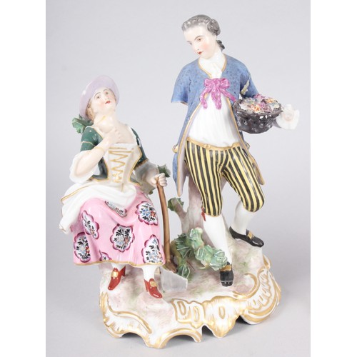 11 - A pair of Continental figures, flower sellers, 7 1/2