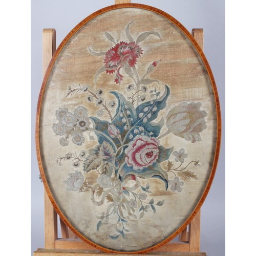 128 - A 19th century silk embroidery of flowers, 16 1/2