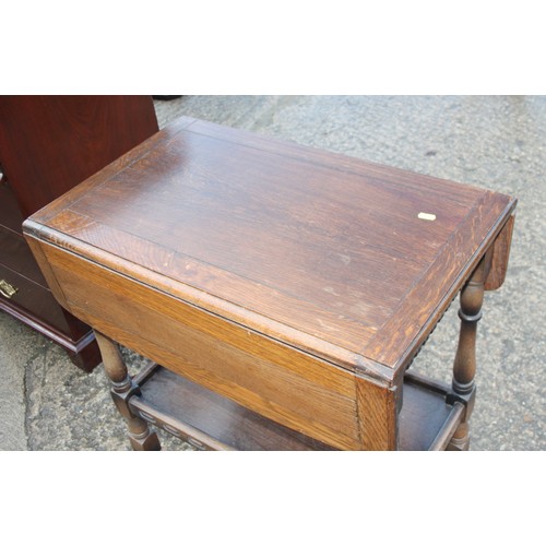 391 - An Art Deco design hardwood two-tier occasional table, 26