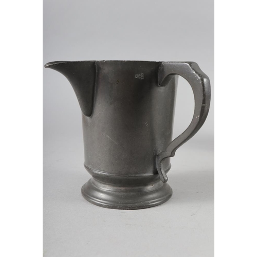 100 - A 19th century pewter tappit hen, 10 1/2