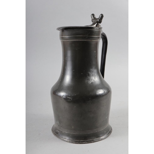 100 - A 19th century pewter tappit hen, 10 1/2