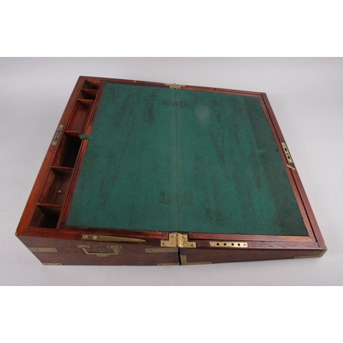 114 - A 19th century mahogany writing box with brass carrying handles, 6