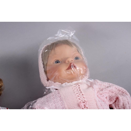 121 - A quantity of porcelain dolls by 