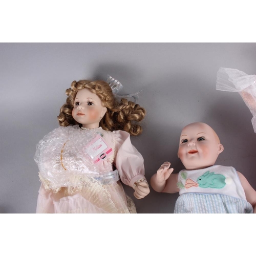 121 - A quantity of porcelain dolls by 