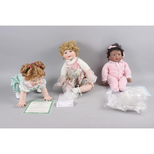 121 - A quantity of porcelain dolls by 