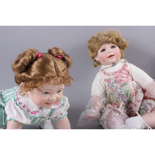 121 - A quantity of porcelain dolls by 