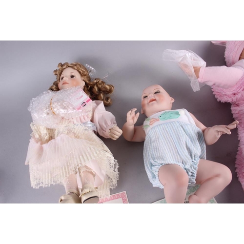 121 - A quantity of porcelain dolls by 