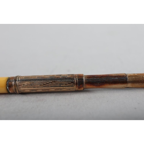 135 - A 19th century dip pen with ivory handle, in tooled and gilt leather Aikin, Lambert & Co box