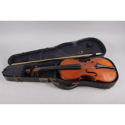 137 - A violin with two-piece back and a bow, 22 3/4