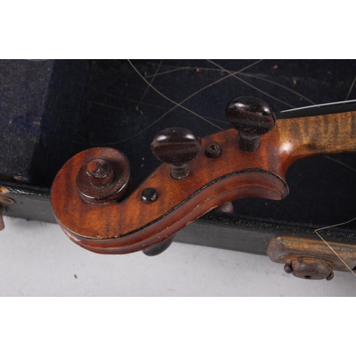 137 - A violin with two-piece back and a bow, 22 3/4