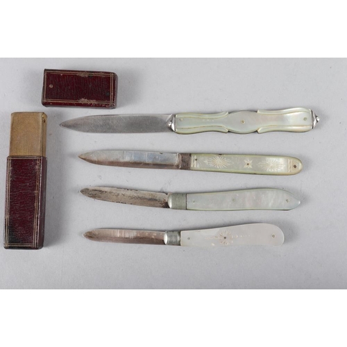 193 - A 19th century silver and mother-of-pearl fruit knife, in original case, and three others