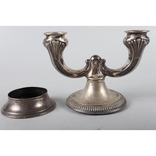 197 - A Danish silver two-light table candelabra with weighted base, 4 3/4