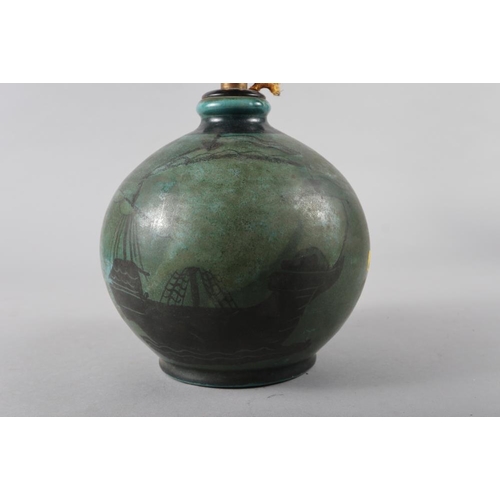 28 - A studio pottery jug with floral decoration, 12