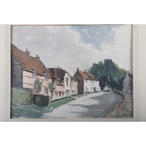 286 - A watercolour of cottages, 11 1/2