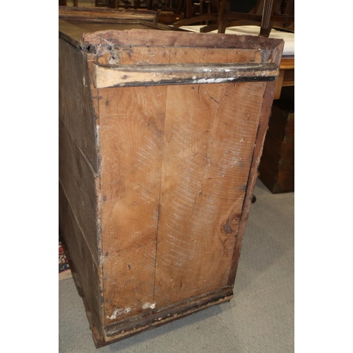 301 - An early 18th century provincial yew wood chest of two short and three long drawers with embossed br... 