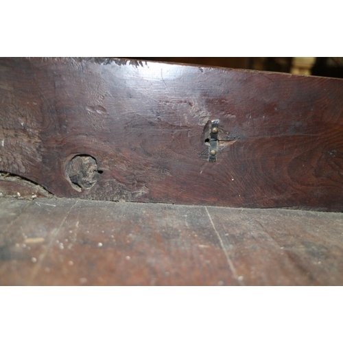 301 - An early 18th century provincial yew wood chest of two short and three long drawers with embossed br... 