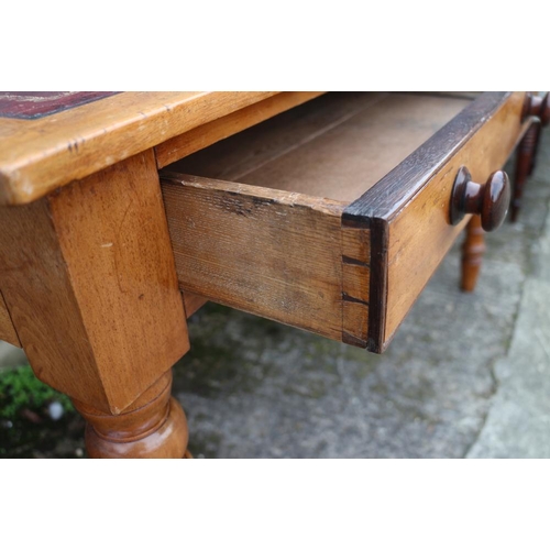 307 - A late 19th century mahogany tray top writing desk with tooled lined top, fitted two drawers, on tur... 