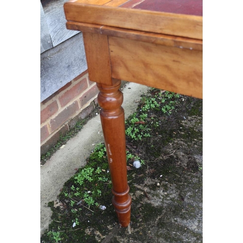 307 - A late 19th century mahogany tray top writing desk with tooled lined top, fitted two drawers, on tur... 